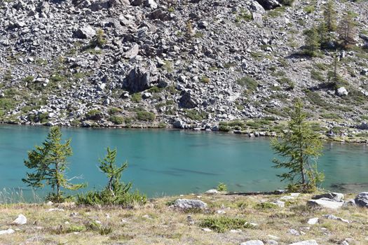 Lake Muffè, a small and colorful alpine lake, above Champorcher