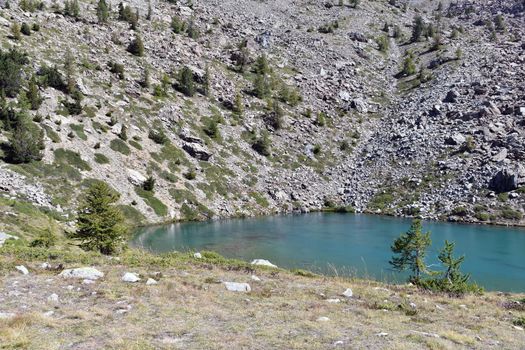 Lake Muffè, a small and colorful alpine lake, above Champorcher