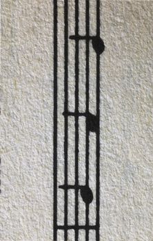 Musical note lines with notes in an unusual photo composition , top view , macro ,  graphic effect 