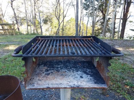 dirty rusty barbecue grill metal with coal ash