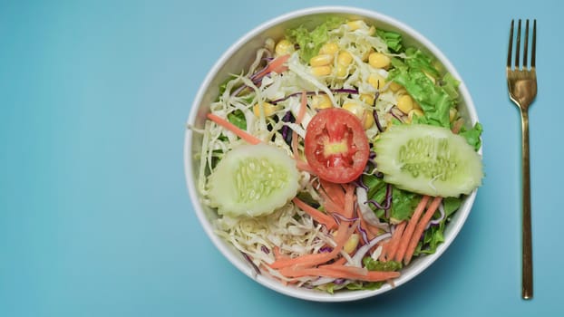 Fresh colorful vegetables salad bowl.