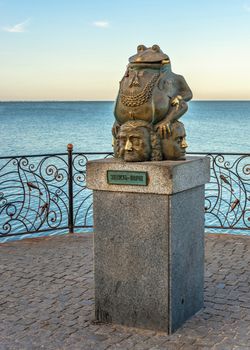 Berdyansk, Ukraine 07.23.2020. Monument to the toad on the embankment of Berdyansk, Ukraine, on an early summer morning