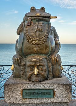 Berdyansk, Ukraine 07.23.2020. Monument to the toad on the embankment of Berdyansk, Ukraine, on an early summer morning