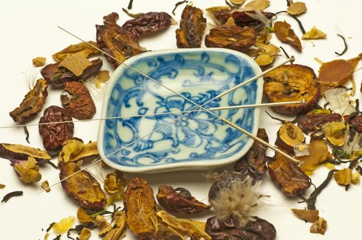 Acupuncture needle and chinese herbs