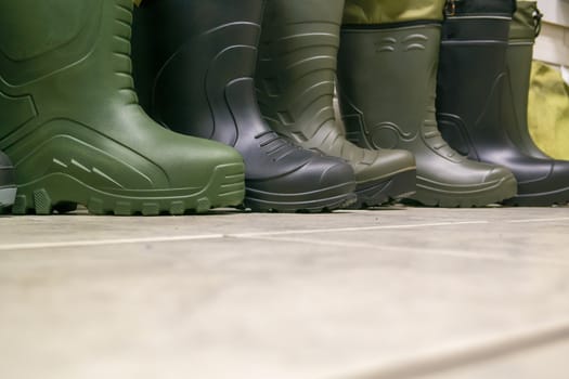 Different rubber boots, work shoes for rainy dirty weather