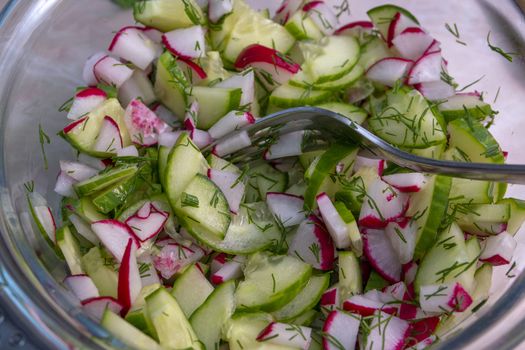 healthy eating. Vegetables. Juicy radish and cucumber salad with dill