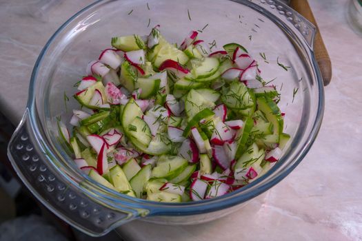 healthy eating. Vegetables. Juicy radish and cucumber salad with dill