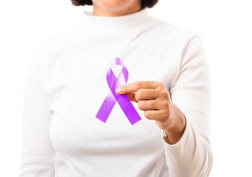 National Epilepsy or Alzheimer disease Day. Young woman holding purple ribbon on hand symbol of Pancreatic cancer, Epilepsy awareness and world Lupus Day and world cancer isolated white background