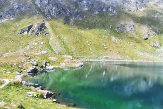 The colorful alpine lake of Brenguez