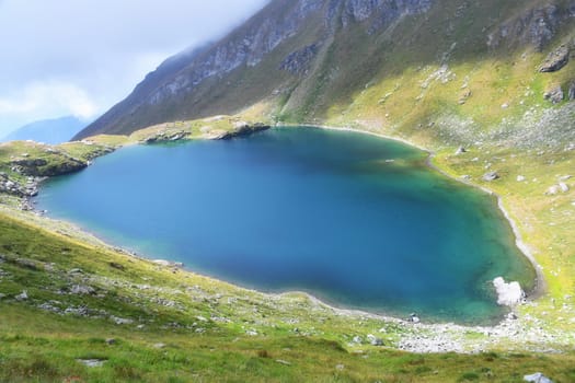 The colorful alpine lake of Brenguez