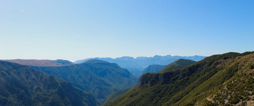 Banner, a magnificent view of the mountain peaks disappearing into the background. Mountains of Bosnia and Herzegovina. Bjelasnica Mountain, Bosnia and Herzegovina.