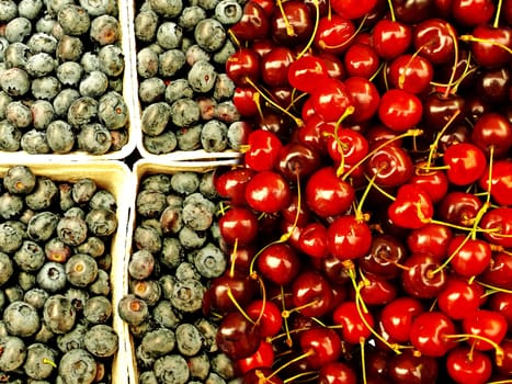 cherries and blueberries at street sale