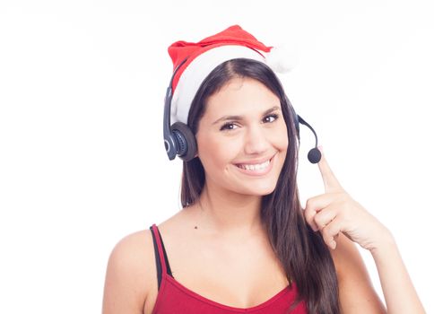 Christmas headset woman from telemarketing call center wearing red santa hat talking smiling isolated on white background.