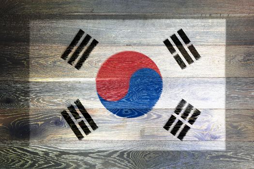 A South Korea flag on rustic old wood surface background