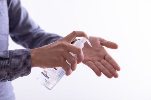 Hand of man that applying alcohol gel to make cleaning and clear germ, bacteria, Health care concept