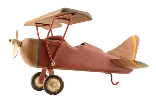 An isolated wood toy plane for the kids to play with.