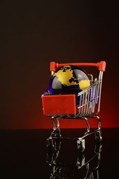 A conceptual image of global shopping over a red background.
