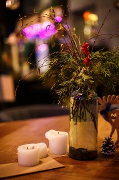 Minimalistic Christmas decor cozy warm room with wooden furniture.