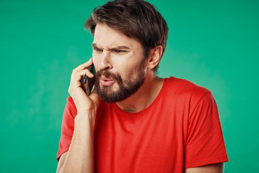 Man with mobile phone wrinkled face problems at work communication