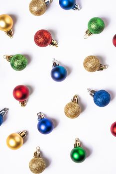 Christmas composition with colorful balls and ornaments decorations on white background