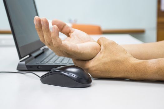 concept Tenosynovitis is the most common tendon inflammation of the wrist time of use of the personal computer or keyboard mouse 
