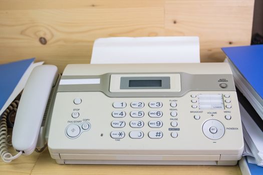 The fax machine for Sending documents in the office concept equipment needed in office 