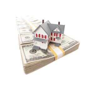 Small House on Row of Hundred Dollar Bill Stacks Isolated on a White Background.