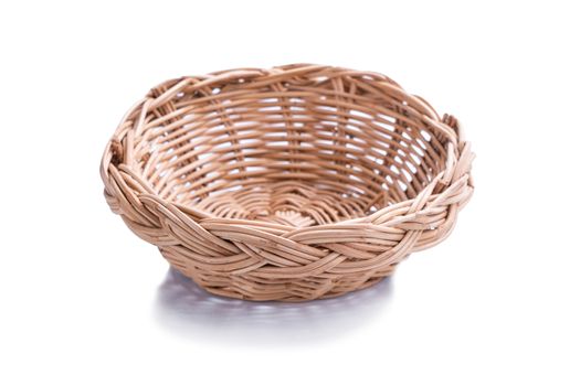 Empty wicker basket  isolated on white background
