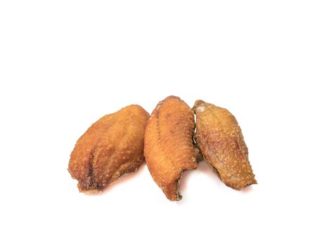 The close up of deep fried fish (Nile Tilapia fish) Thai food on white background.