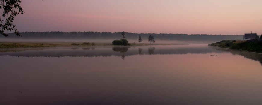 Smoke of mist over the pond. morning mist over the pond.