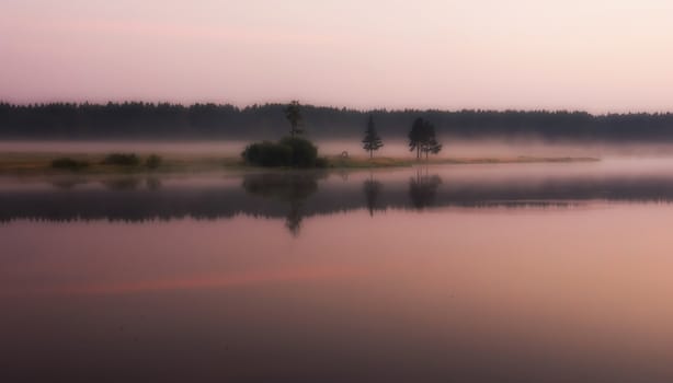 Smoke of mist over the pond. morning mist over the pond.