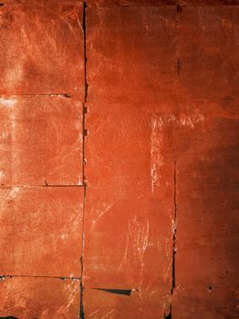 Golden foil paper texture background. Abstract Painting art textured Close-up detail of cracked paint on rusty metal wall. Cracked painted old metal. Rusted surface. Copy space for your text. Toned