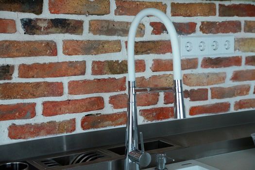 white kitchen interior in loft style close up