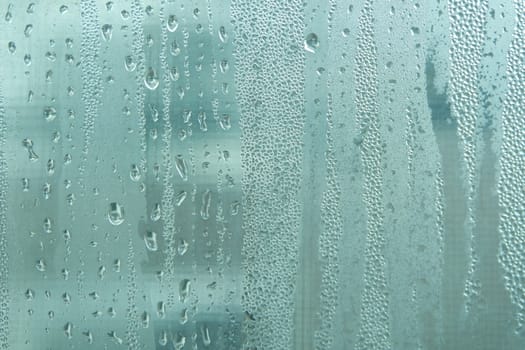 Bright grey color glassy texture, with water drops on it. Water drop glassy background