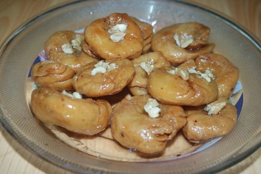 Closeup of delicious and tasty Asian sweet dish called balu shahi or baloshahi or balushahi. This dish is street sweet found in Pakistan India and Bangladesh and served in the festivities.