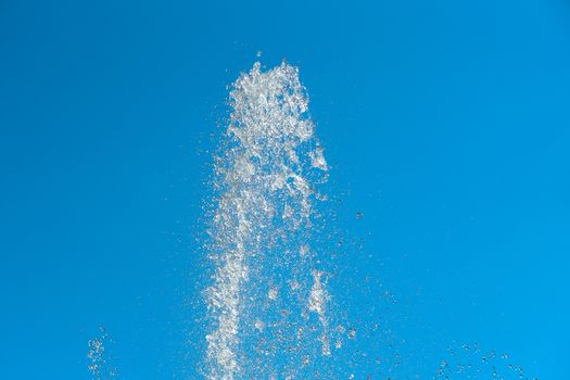 Abstract an outbreak of water. Splash of water close-up. Frozen water drop photographed at high speed.Slow dripping of liquid with air bubbles. Nature backgrounds or Wallpaper.Frozen liquid splashes