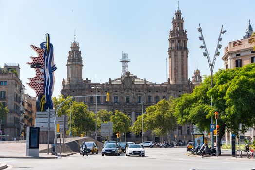 Barcelona, Spain - July 28 2020:  People walking through empty streets after COVID 19 in Barcelona, Spain.