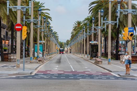 Barcelona, Spain - July 28 2020:  Trafic in  through empty streets after COVID 19 in Barcelona, Spain.