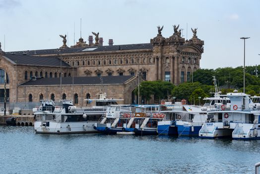 Barcelona, Spain - July 28 2020:  Reial Club Marítim Barcelona Port through empty streets after COVID 19 in Barcelona, Spain.