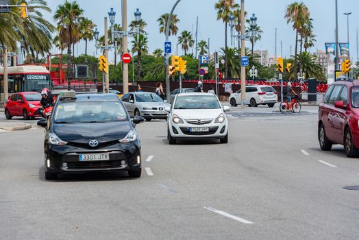 Barcelona, Spain - July 28 2020:  Trafic in  through empty streets after COVID 19 in Barcelona, Spain.