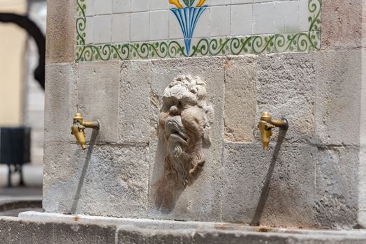 Barcelona, Spain : july 29, 2020 : Antique street drink water source in gothic quarter, Barcelona, Catalonia, Spain. Barcelona, Spain, july 29, 2020