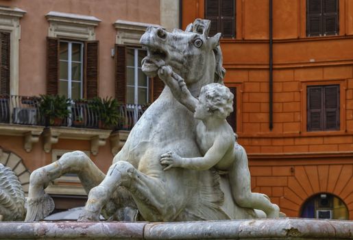 Fontana del Nettuno, fountain of Neptune, in colorful Piazza Navona, Roma, Italy
