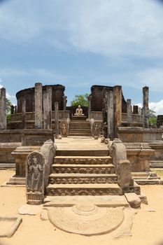 Polonnaruwa Sri Lanka Ancient ruins. Statues including Buddha stupa carvings . High quality photo