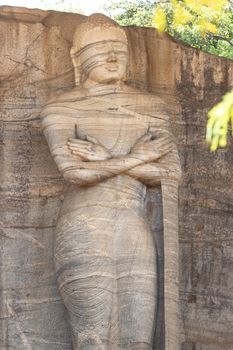 Polonnaruwa Sri Lanka Ancient ruins. Statues including Buddha stupa carvings . High quality photo