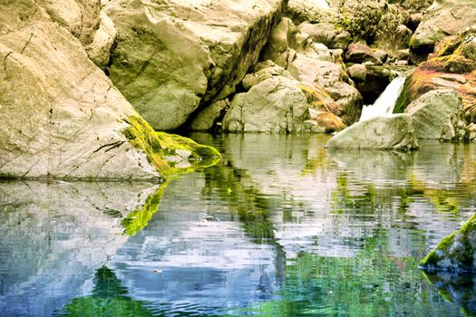 Small lake formed by the waters of the stream