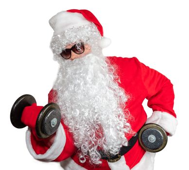Santa Claus working out with two dumbbells and doing bicep curls. Santa wearing sunglasses and a long white beard. Isolated on white background.