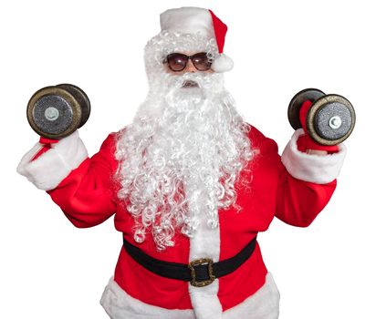 Santa Claus working out and pushing two dumbbells up in the air. Santa wearing sunglasses and a long white beard. Isolated on white background.