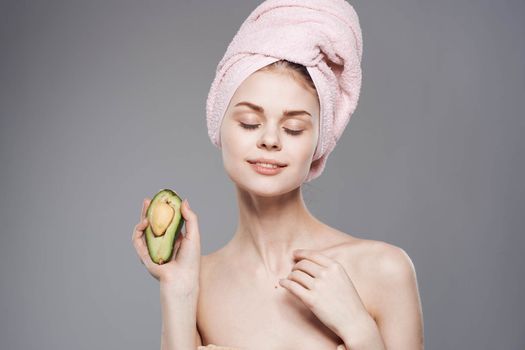 cheerful woman naked shoulders healthy skin vitamins avocado lifestyle. High quality photo
