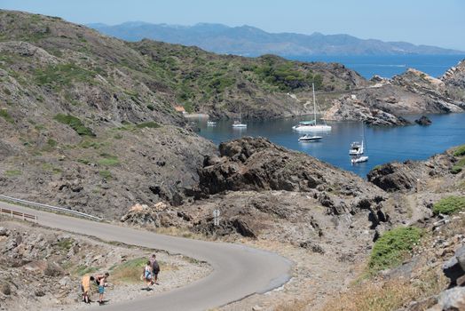 Parc Natural Cap de Creus, Spain :  8 july 2020 : Sea landscape with Cap de Creus, natural park. Eastern point of Spain, Girona province, Catalonia. Famous tourist destination in Costa Brava. Sunny summer day with blue sky and clouds