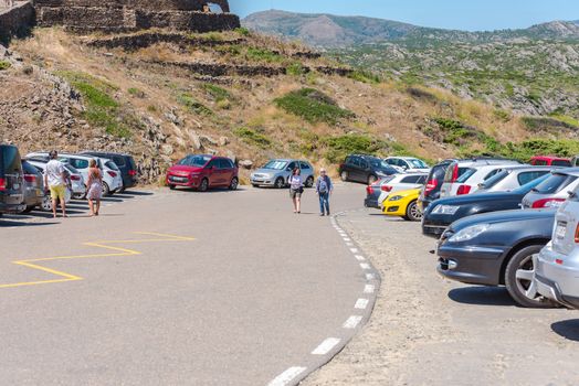 Parc Natural Cap de Creus, Spain :  8 july 2020 : People in Cap de Creus, natural park. Eastern point of Spain, Girona province, Catalonia. Famous tourist destination in Costa Brava. Sunny summer day with blue sky and clouds